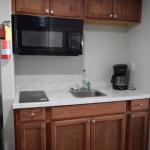 3-Bed Suite with Separate Queen Bed Area (Parking area view)